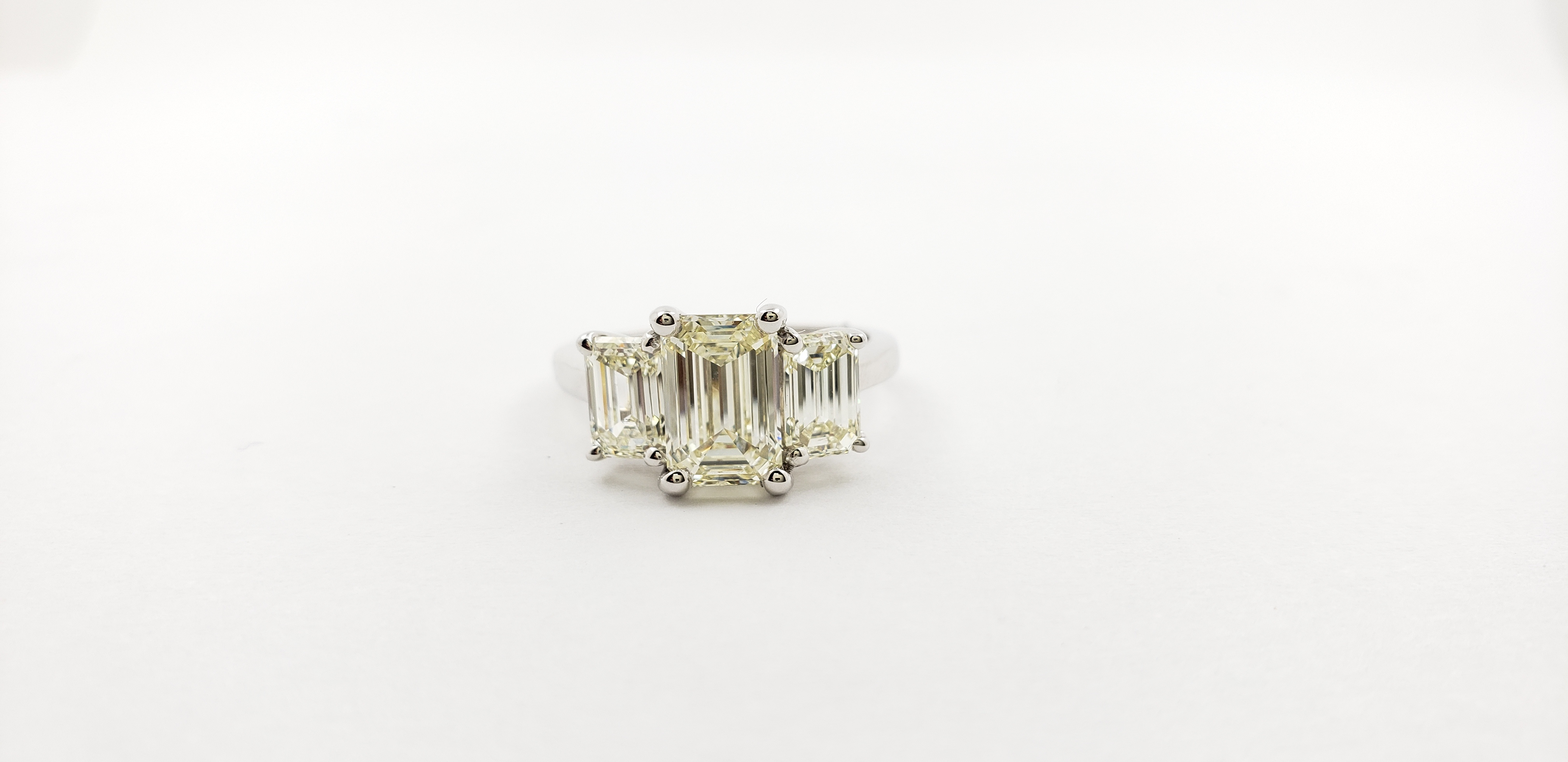 Three-Stone Emerald Cut Diamond Ring